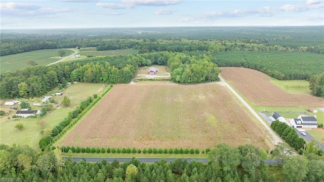 birds eye view of property featuring a rural view