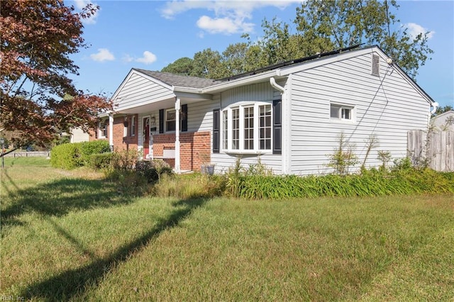 exterior space with a lawn