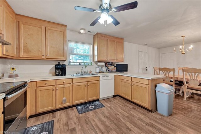 kitchen with sink, hanging light fixtures, kitchen peninsula, white dishwasher, and stainless steel electric range