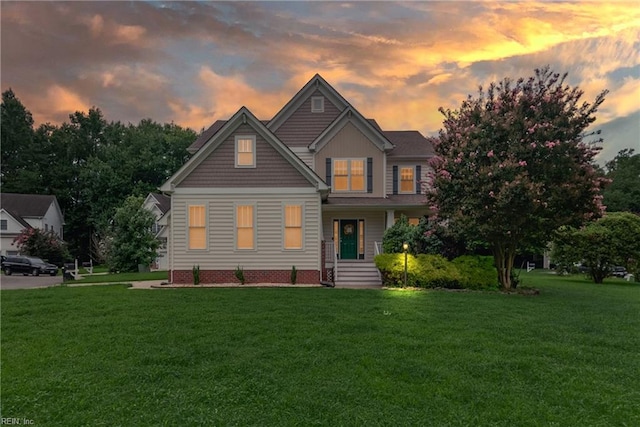 craftsman-style home featuring a yard