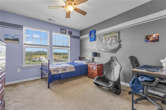 bedroom featuring carpet flooring and ceiling fan