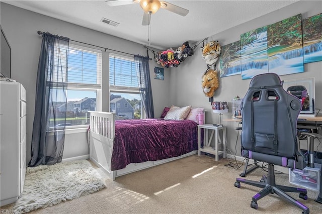 bedroom with carpet flooring and ceiling fan