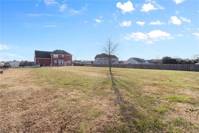 view of yard with an outdoor structure