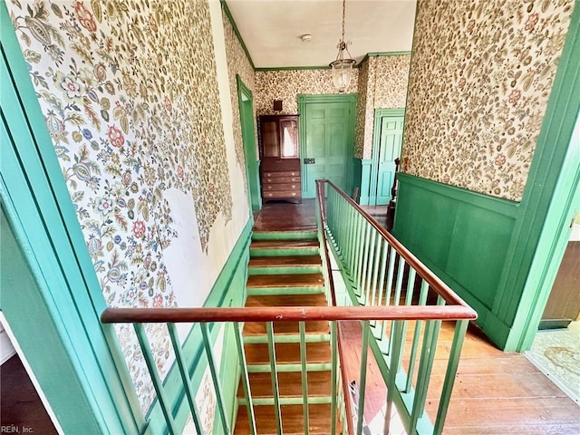 stairway with wood-type flooring