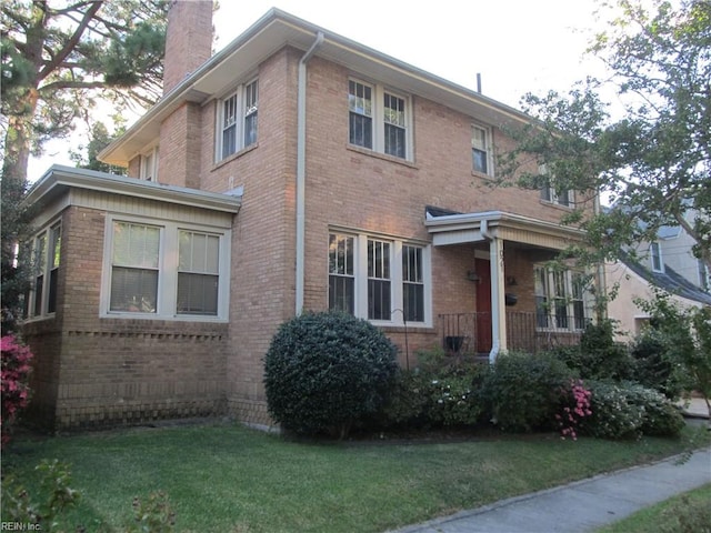 view of property exterior featuring a lawn