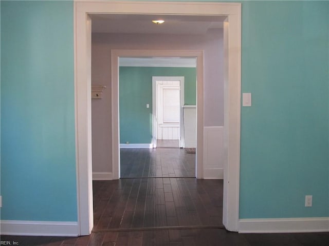 hallway featuring dark hardwood / wood-style floors