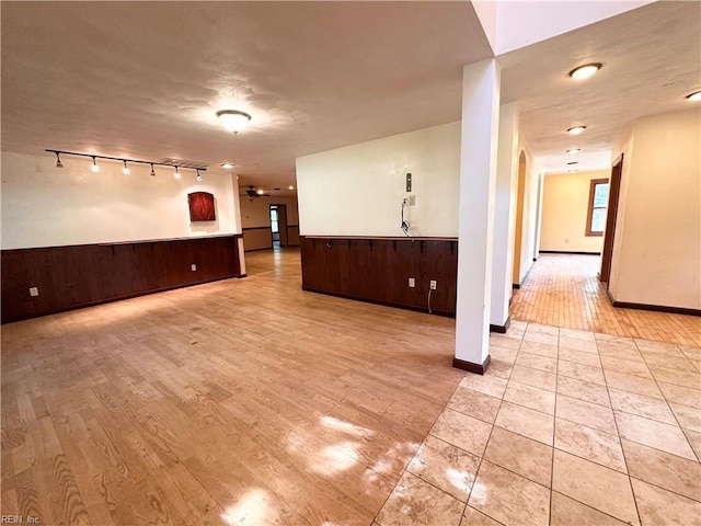 1057 W Rd, Chesapeake, VA 23323 - empty room featuring light wood-type flooring and track lighting