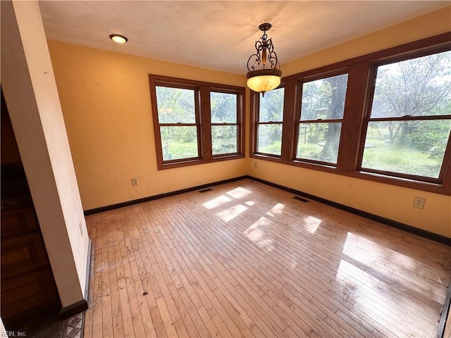 1057 W Rd, Chesapeake, VA 23323 - spare room with baseboards and light wood-type flooring
