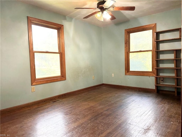 1057 W Rd, Chesapeake, VA 23323 - empty room with hardwood / wood-style flooring, a ceiling fan, and baseboards