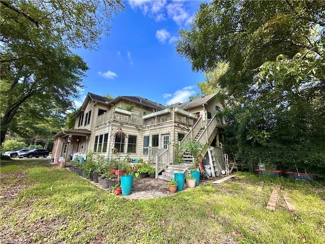 1057 W Rd, Chesapeake, VA 23323 - back of property featuring a lawn and stairs