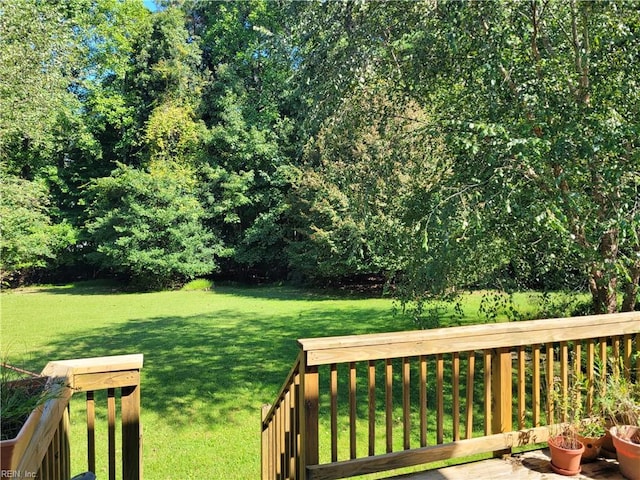 view of yard with a wooden deck