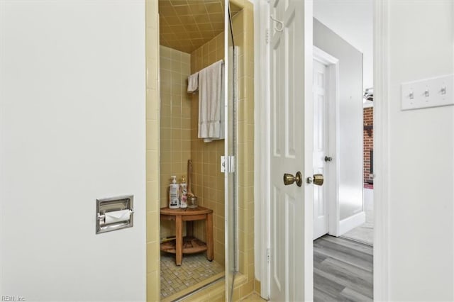 hallway with light hardwood / wood-style flooring