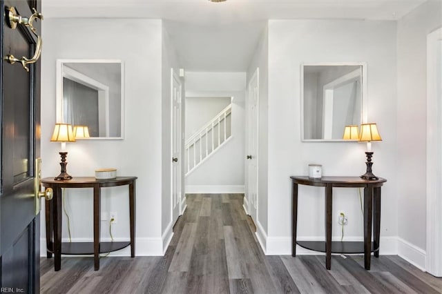 corridor featuring dark wood-type flooring