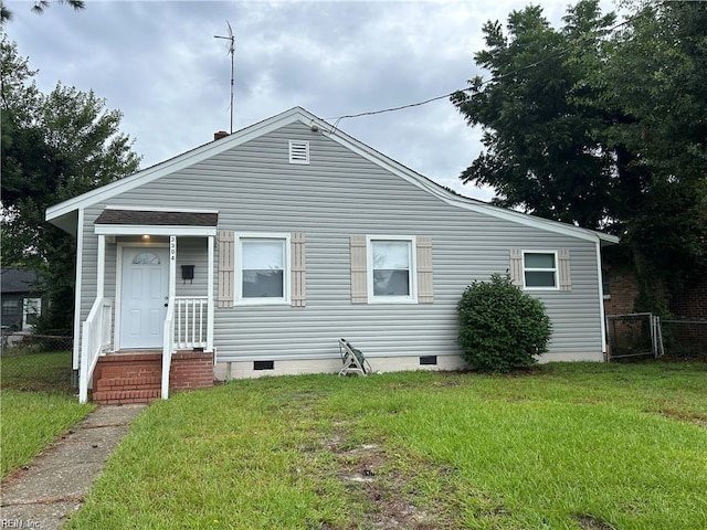 view of front of home with a front lawn