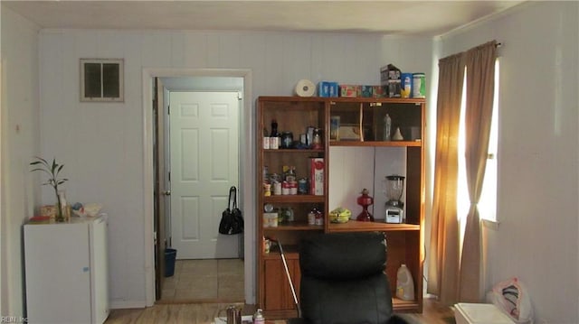 interior space featuring light tile patterned floors