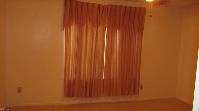 unfurnished room with ceiling fan