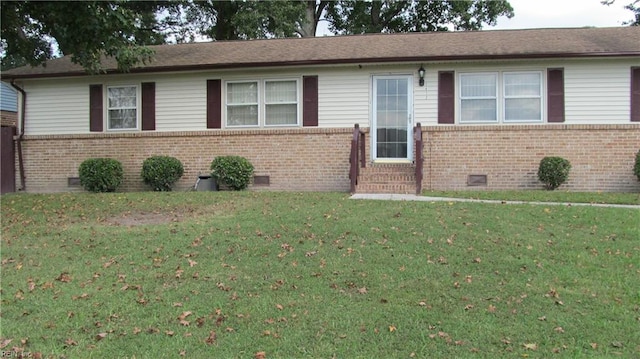 ranch-style house with a front yard