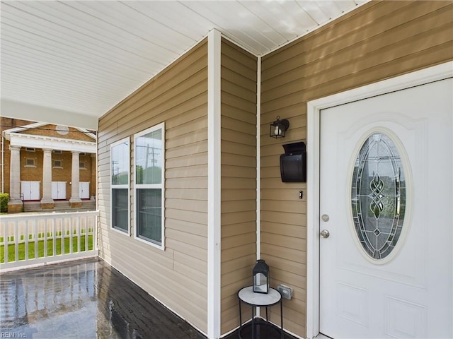 property entrance with a porch