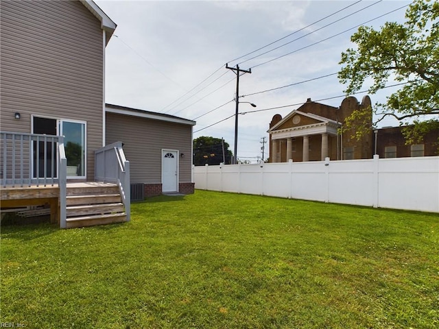 view of yard featuring a wooden deck