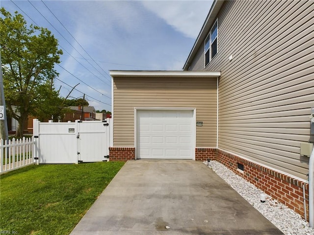 garage with a lawn