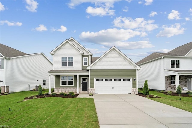 craftsman house with a front yard, a garage, and covered porch