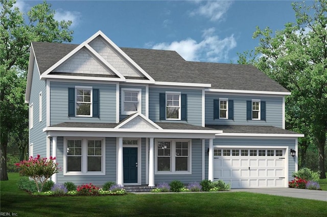 view of front of property with a garage and a front lawn