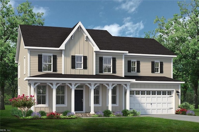 view of front of property with a garage and a front yard