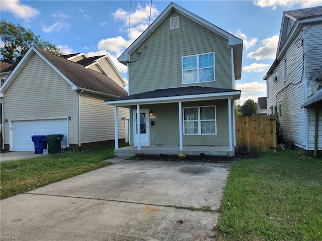 view of property featuring covered porch, a front yard, and a garage