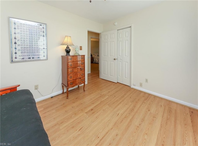 sitting room featuring wood-type flooring