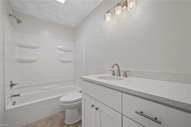 full bathroom featuring vanity, bathtub / shower combination, toilet, and tile patterned flooring