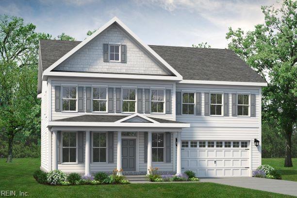 view of front facade with a front lawn and a garage