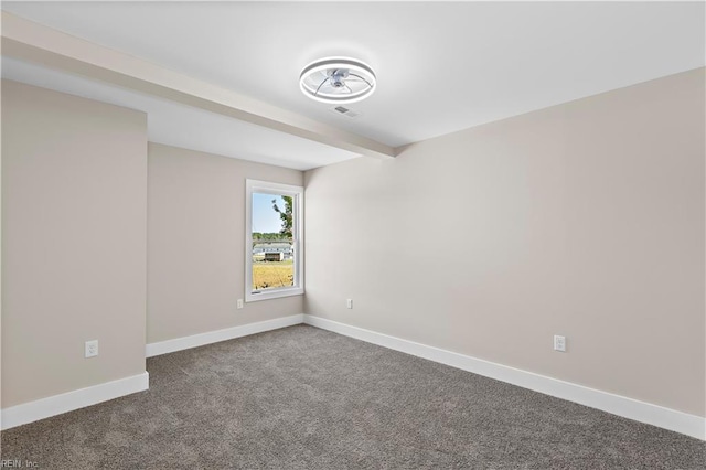 empty room with carpet flooring