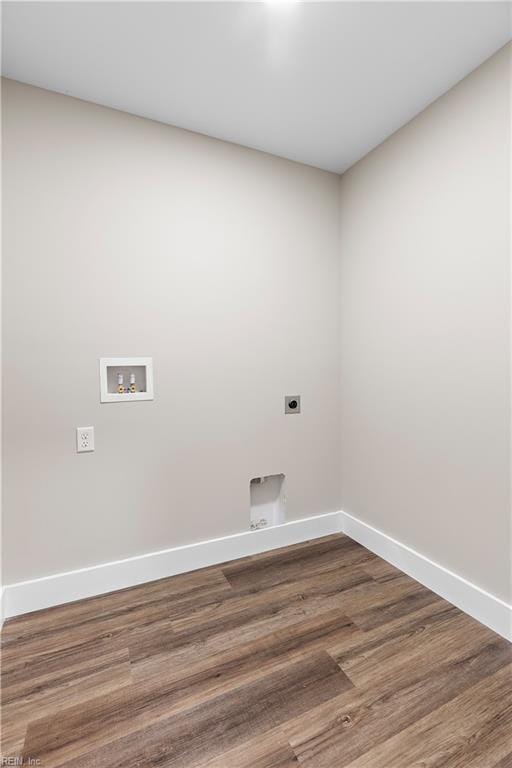 washroom with hookup for a washing machine, wood-type flooring, and hookup for an electric dryer