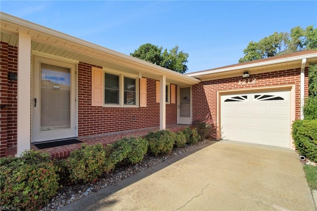 ranch-style home featuring a garage