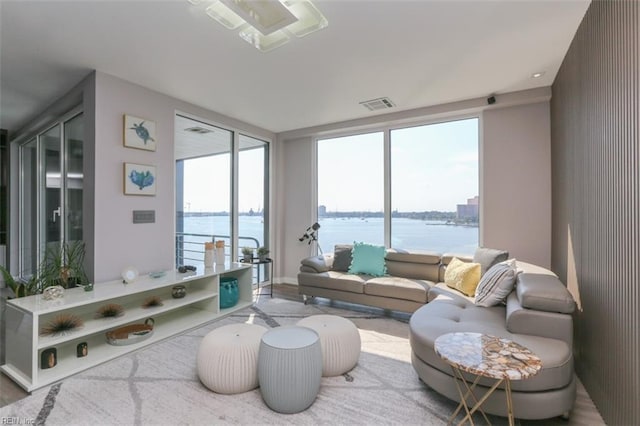 sunroom with a water view