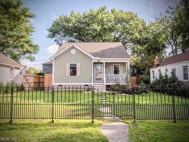 bungalow featuring a front yard and a porch