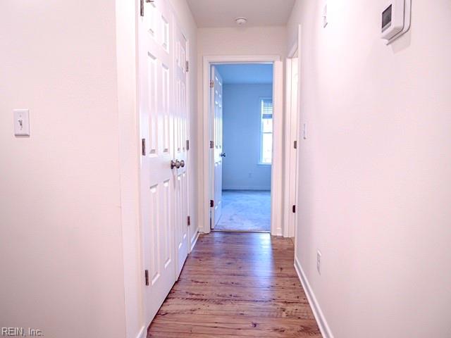 corridor featuring light hardwood / wood-style flooring