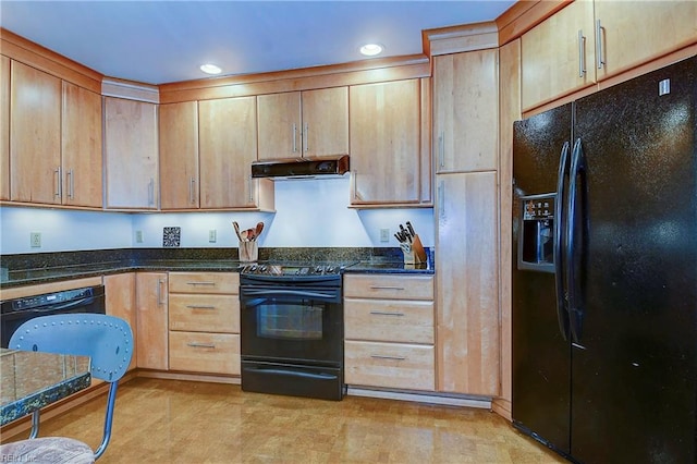 kitchen featuring dark stone countertops, light brown cabinets, and black appliances