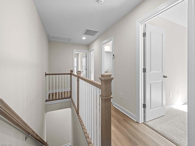 hall featuring light hardwood / wood-style floors