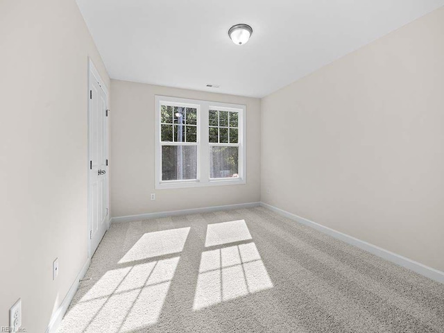 empty room with light carpet