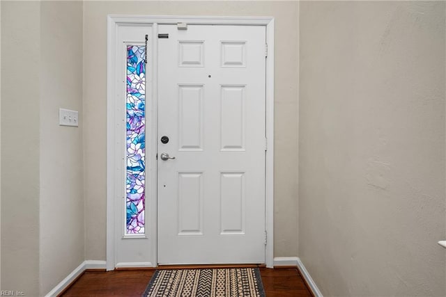 entryway with wood-type flooring