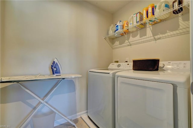 washroom with washer and clothes dryer