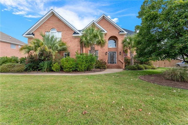 front facade with a front yard