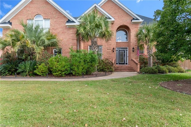 view of front facade featuring a front yard