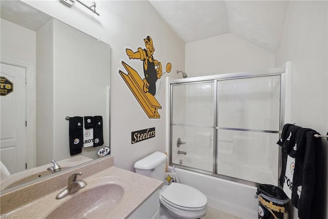 full bathroom featuring enclosed tub / shower combo, vaulted ceiling, vanity, and toilet