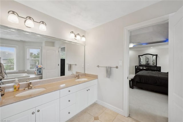 bathroom with vanity and tile patterned flooring