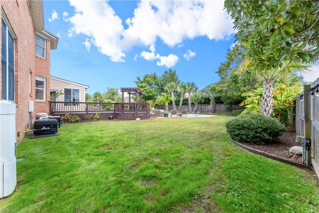 view of yard with a deck