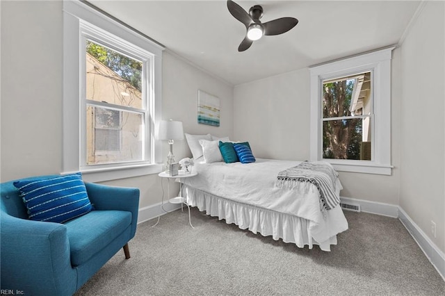 bedroom featuring ceiling fan and carpet floors