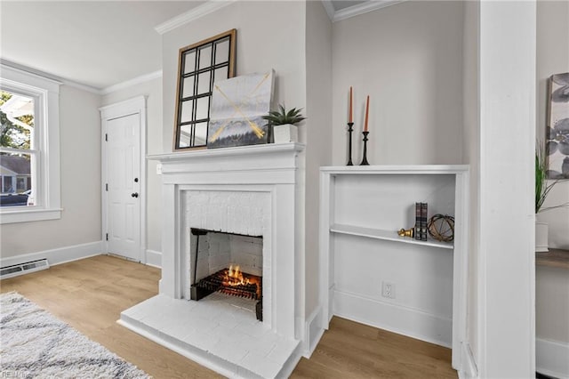 room details featuring wood-type flooring, ornamental molding, and a brick fireplace