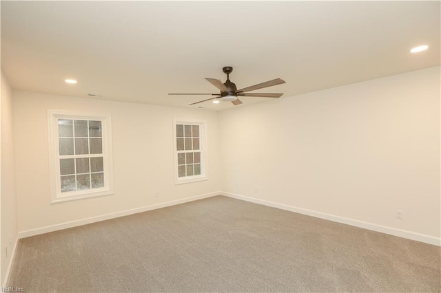 empty room with carpet and ceiling fan